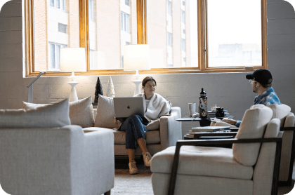 Who We Are 3 - People doing office stuff in comfortable area