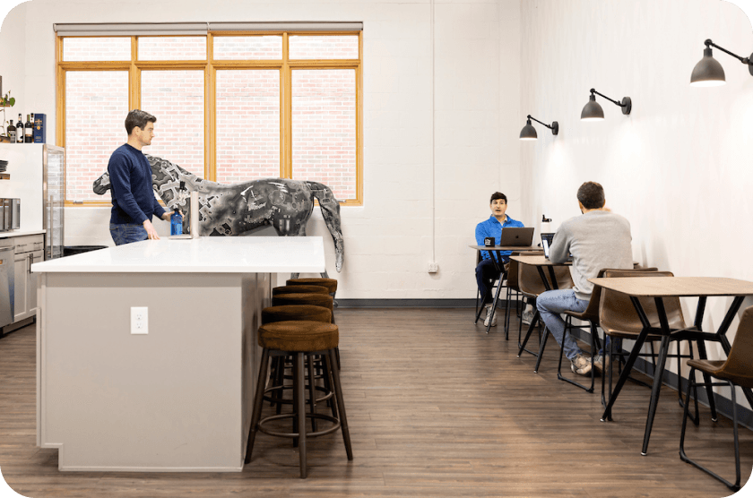 Who We Are 5 - People in office kitchen area